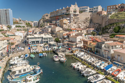 High angle view of townscape by sea