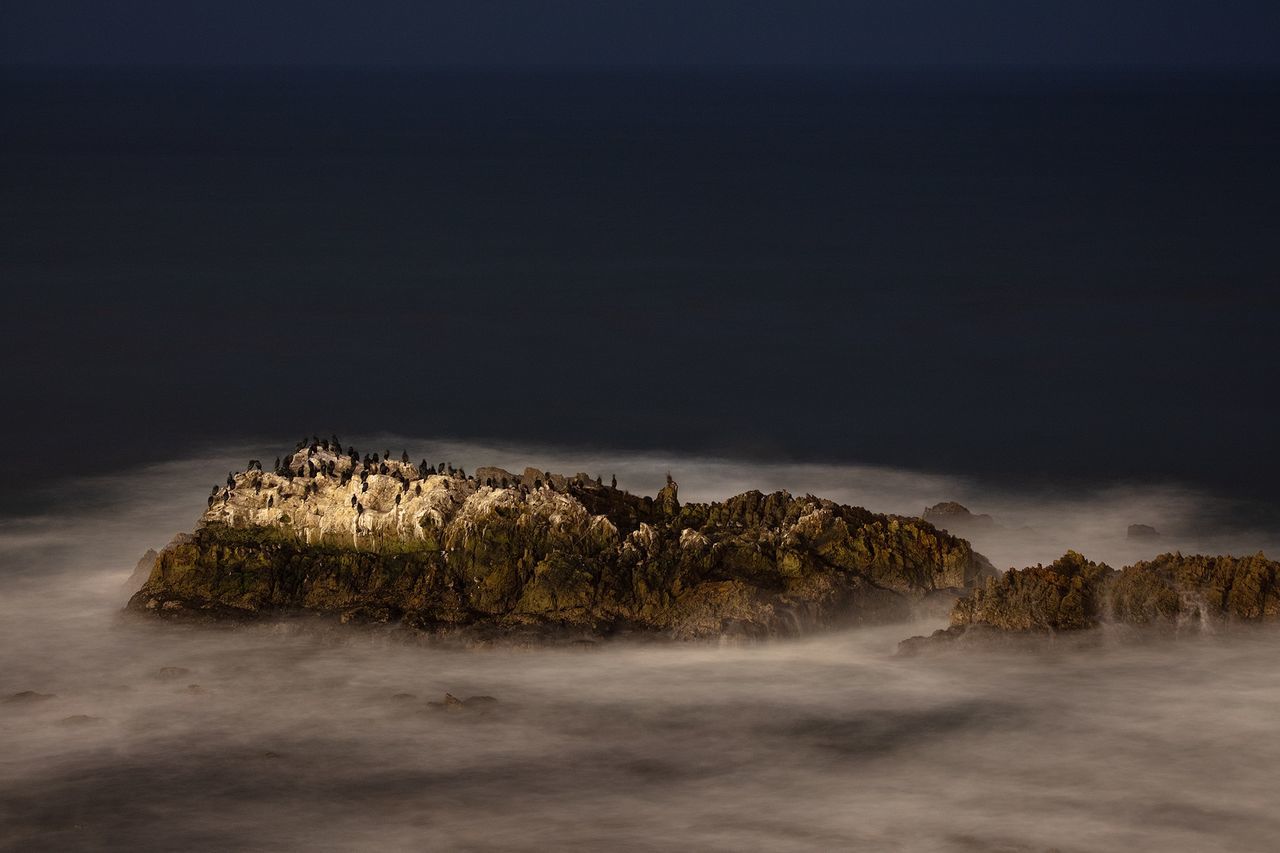 wave, coast, horizon, sea, ocean, cloud, morning, rock, nature, water, land, beauty in nature, sky, darkness, no people, scenics - nature, dawn, shore, reflection, fog, night, environment, long exposure, landscape, outdoors, tranquility, beach, terrain, motion, light