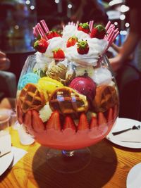 Close-up of ice cream served on table