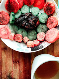 Directly above shot of strawberries in plate on table