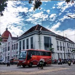 View of building against cloudy sky