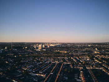 High angle view of buildings against sky during sunset