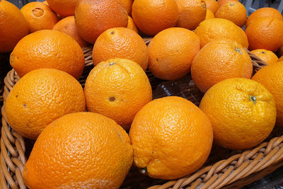 High angle view of fruits in basket for sale