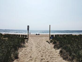 Scenic view of beach against clear sky