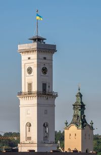 Lviv, ukraine . town hall on the market square of lviv, ukraine, on a sunny summer day