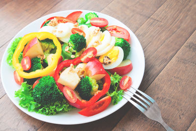 High angle view of salad served on table