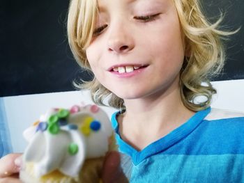 Close-up of girl holding ice cream