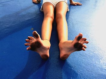 Low section of feet in water