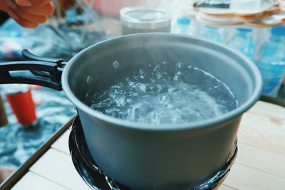 High angle view of person preparing food on table