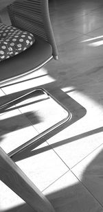 Low section of woman on tiled floor