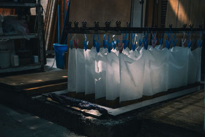 Clothes hanging in row at home