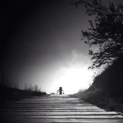 People walking on boardwalk