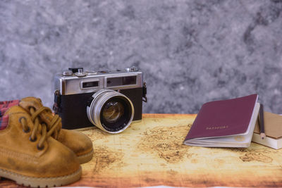 Close-up of camera on table