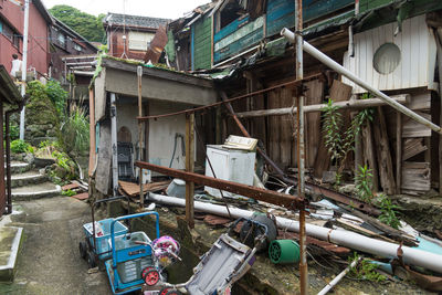 Abandoned house by building