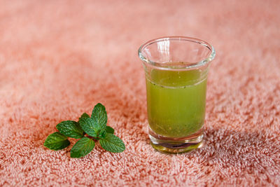 Close-up of drink on glass table