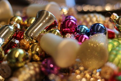 Close-up of multi colored candies on table