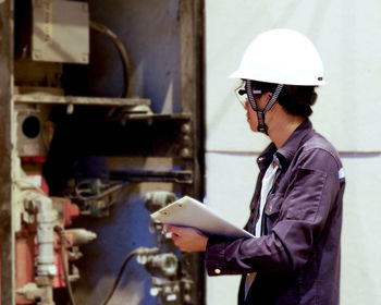 Side view of man working