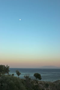 Scenic view of sea at sunset