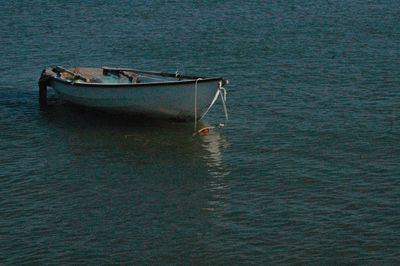 Boat moored on sea