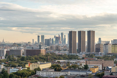 Modern buildings in city against sky