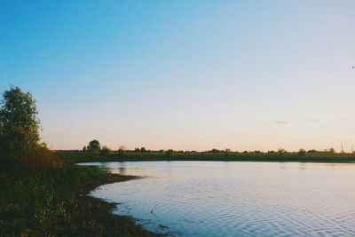 Scenic view of calm sea against clear sky