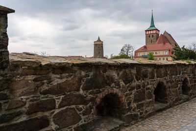 View of historic building against cloudy sky