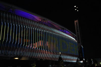 Low angle view of illuminated lights at night