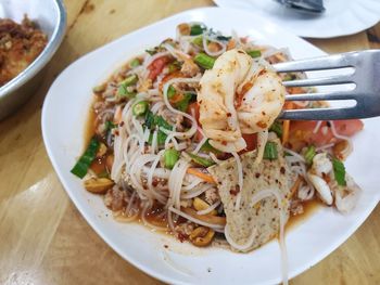 High angle view of pasta in plate on table