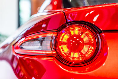 Close-up of red vintage car