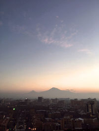 High angle view of townscape against sky at sunset