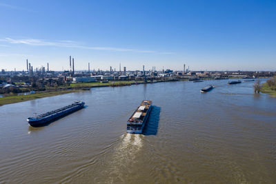 High angle view of ship in river against sky