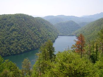 Scenic view of river and mountains