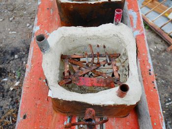 High angle view of rusty machine part