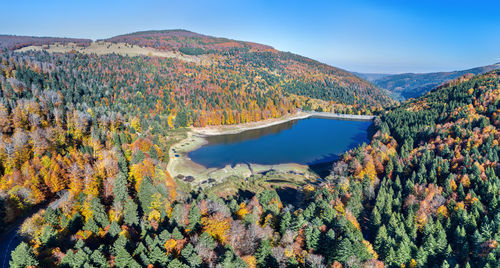 Scenic view of lake against sky during autumn