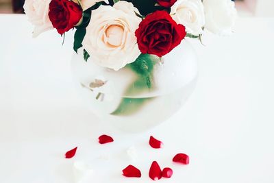 High angle view of rose bouquet on white table