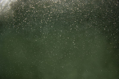 Low angle view of snow against sky