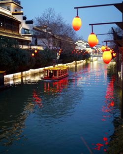 Illuminated fountain at night