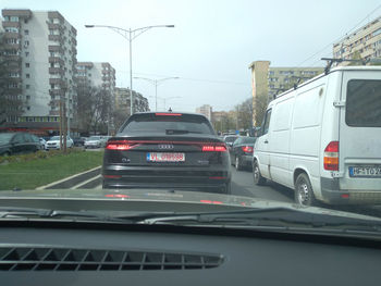 Cars on street in city