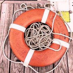 Close-up of red balloons on white wall