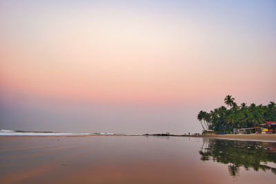 Scenic view of sea against sky at sunset