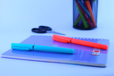 Close-up of colored pencils on table