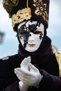 Woman wearing costume and mask during venice carnival