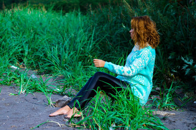 Girl sitting on grass