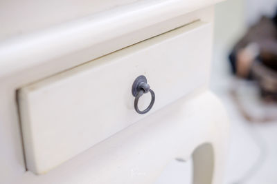 Close-up of white door