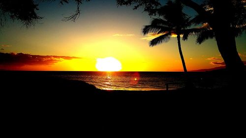 Scenic view of sea at sunset