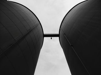 Low angle view of factory against sky