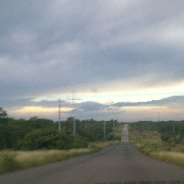 the way forward, road, sky, diminishing perspective, transportation, vanishing point, cloud - sky, country road, cloudy, landscape, tree, empty road, tranquility, tranquil scene, nature, road marking, cloud, weather, long, overcast