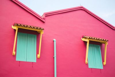 Low angle view of multi colored house on building