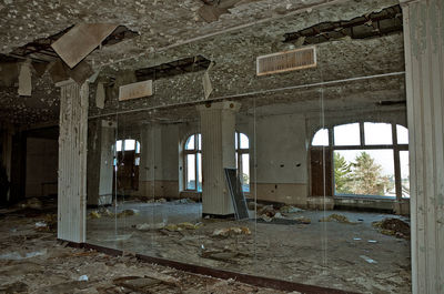 Mirror in damaged abandoned building