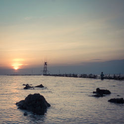 Scenic view of sea against sky during sunset